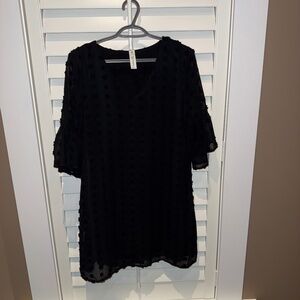 Black polka dot shirt